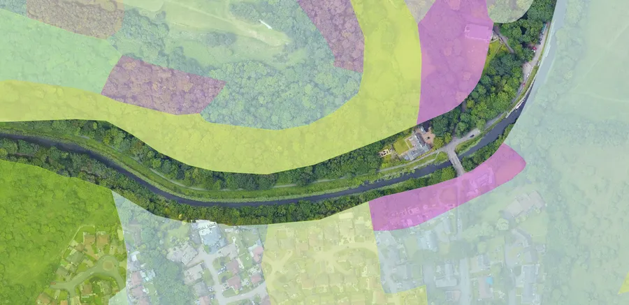 QGIS map of a river and canal with coloured habitat areas drawn over a drone image.